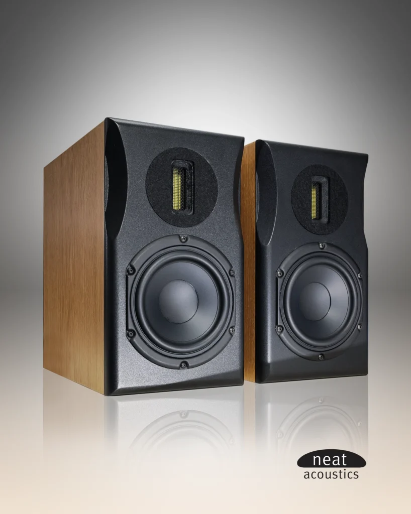 Pair of Neat Acoustics bookshelf speakers with walnut sides and black baffles, each with a tweeter above the woofer.