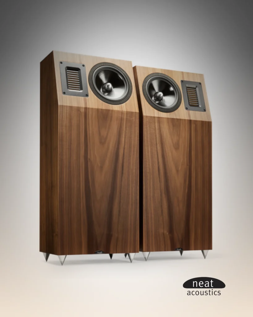 Pair of Neat Acoustics floorstanding speakers in walnut with a sloped top baffle and spiked feet.