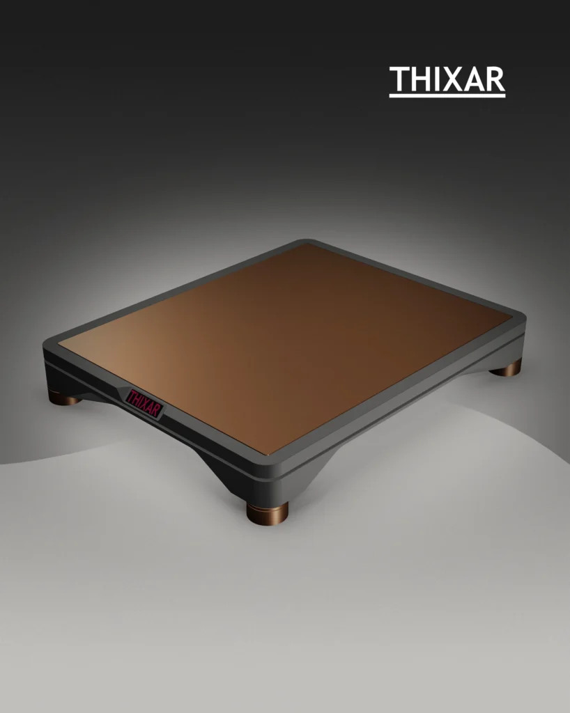 Thixar isolation platform with a copper-toned top, copper feet and a small red display.