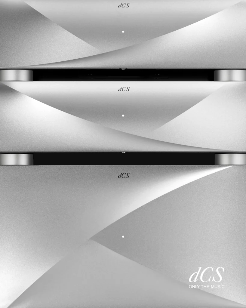Three stacked dCS silver components, their curved front panels catching the light.