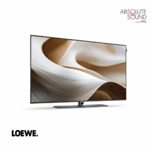 Loewe antares 48 television on a slim central stand, showing an abstract cream and bronze image.