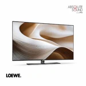 Loewe antares 55 television on a slim central stand, showing an abstract cream and bronze image.