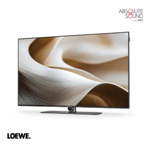 Loewe antares 65 television on a slim central stand, showing an abstract cream and bronze image.